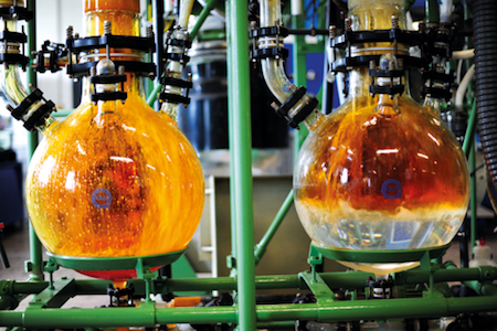 Refining-gold-two-glass-bottles