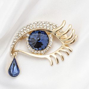 Brosch med safirer och diamanter